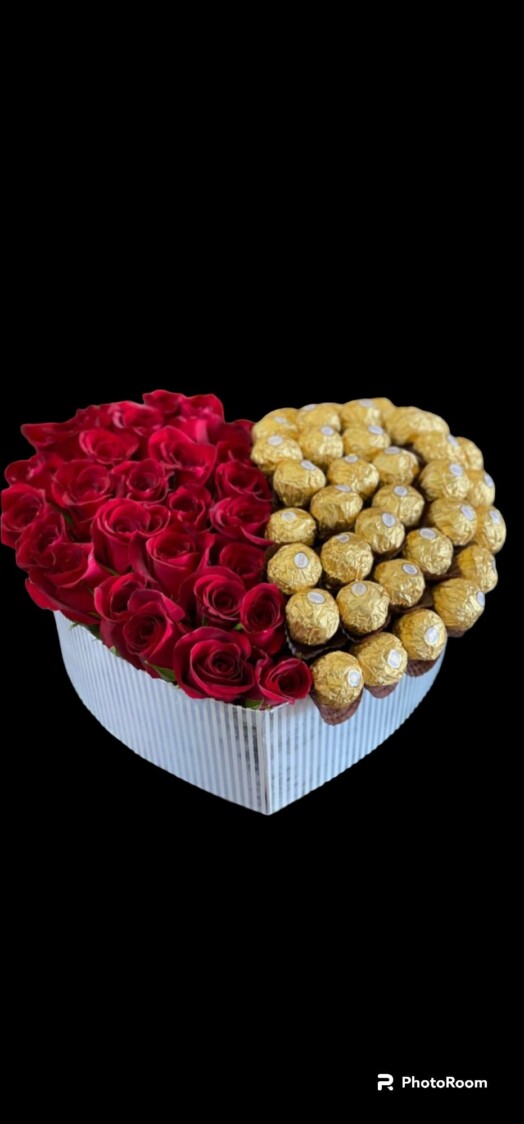 A heart shaped box of roses and chocolates
